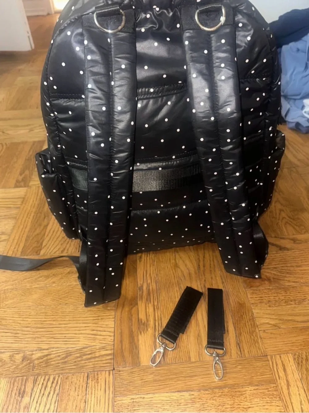 Black Puffer Backpack with White Polka Dots
